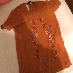 Francesca’s orange dress